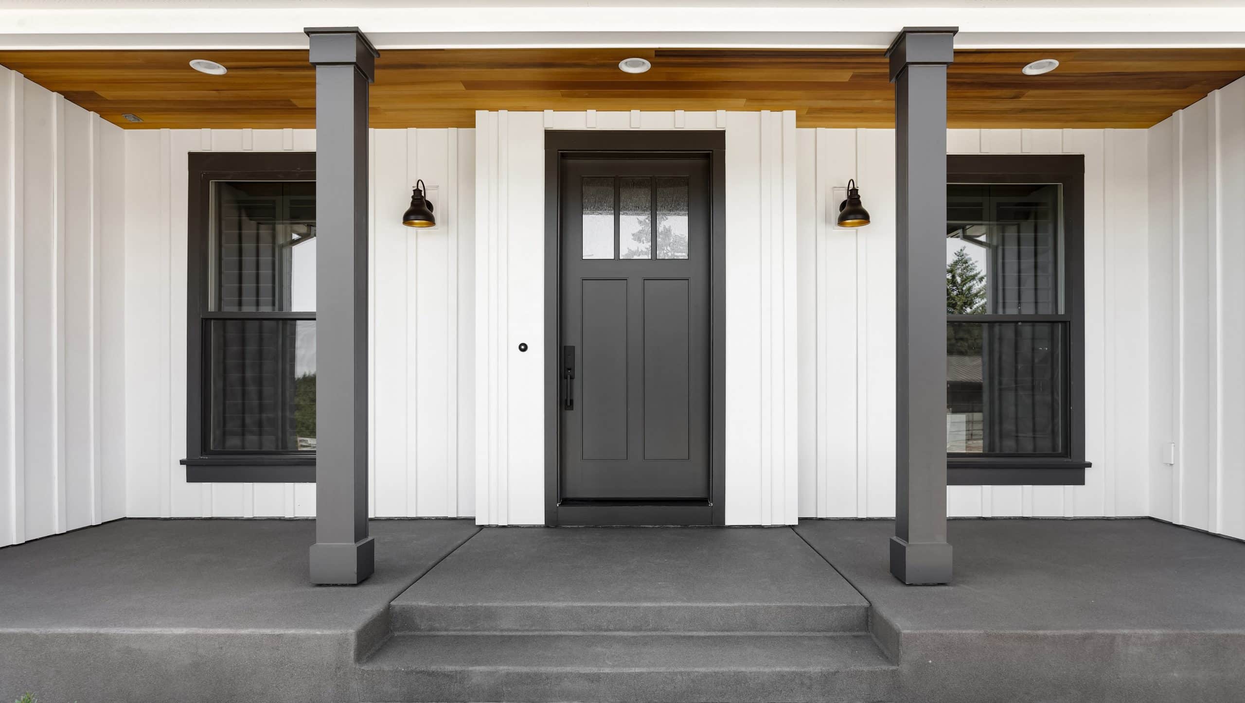 Gorgeous and secure dark gray entry doors and windows on a Jacksonville, FL farmhouse for Jacksonville Doors & Windows